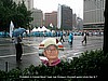 Protesters in Seoul and inset: goodwill volunteer